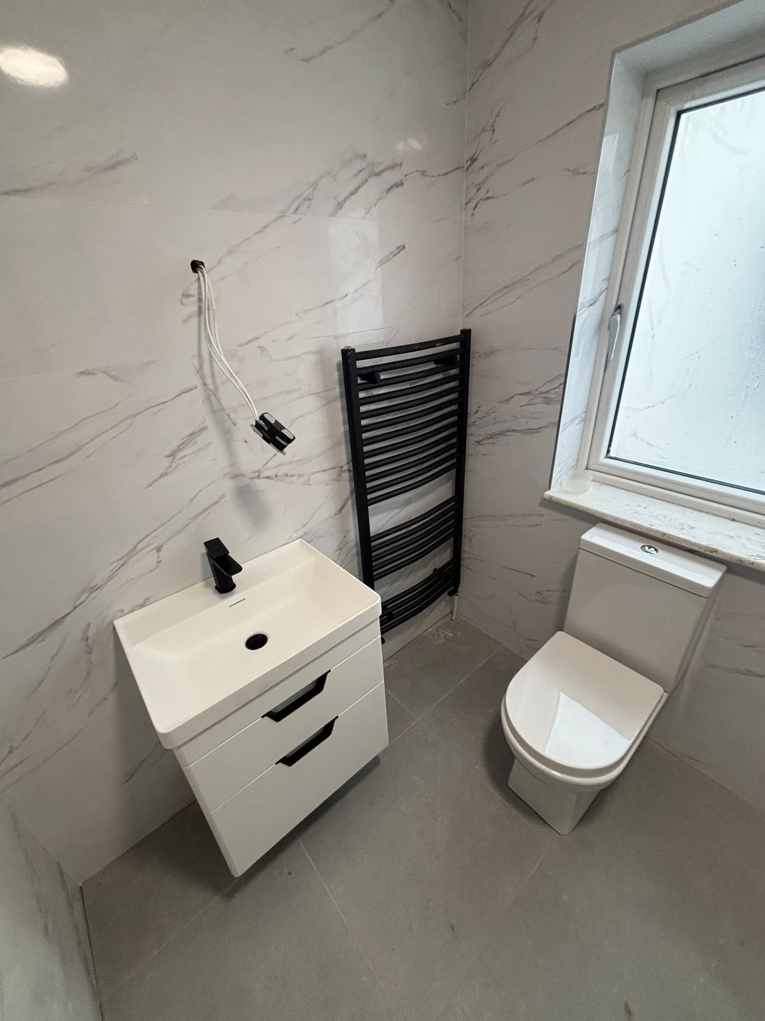 Modern bathroom in Blackrock, Cork with large tiles