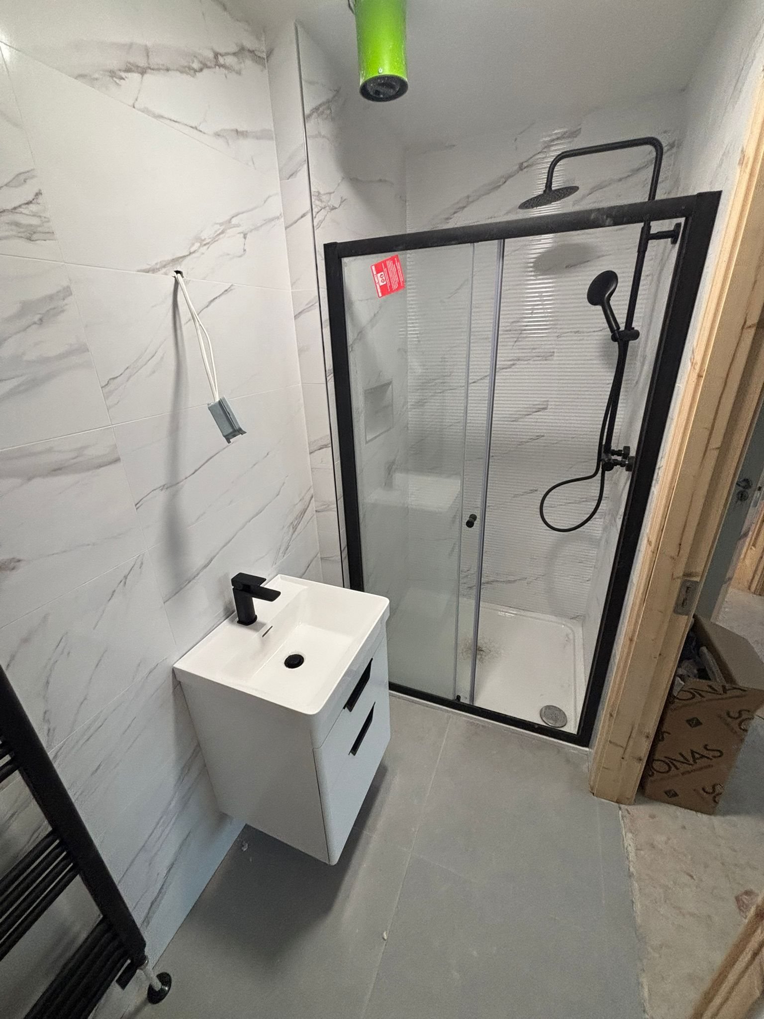 Bathroom renovation in Carrigaline, Cork with tiled floor and walls